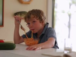 MS Boy eating spaghetti / WOLFEBRO, NH, USA        Stock Footage