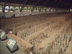 Pan across WA Terracotta Army, high angle, Museum of Qin, Xian, China Stock Footage