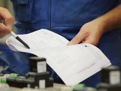 Engineer controlling circuit diagram Stock Footage