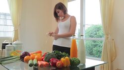 Young asian woman measuring her stomach Stock Footage