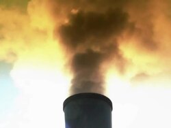 Black and yellow smoke from smoke stack Stock Footage