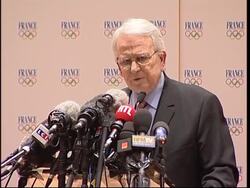 Head of French Olympic Committee gives presser Instructional Video