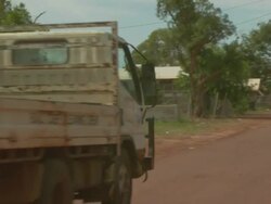 Pick-up truck on dirt road, Maningrida Indigenous Community, NT, Australia Stock Footage