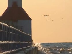 Lighthouse with Seagulls and Surf at Sunset Part 2 Stock Footage