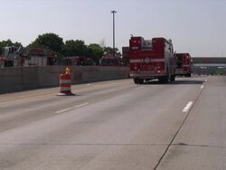 Firefighters, fire trucks on emergency site. Rescue mission, highway accident. Stock Footage