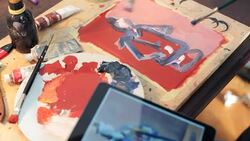 Artist teaching a young student using a digital tablet. Stock Footage