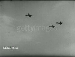1942: FORT JACKSON REVIEW: TU WS TRACKING Three aircraft in silhouette w/ Army infantry paratrooper parachutes opening in sky. Instructional Video