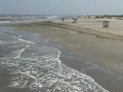 BP Contractors Score Beach for Tarballs Stock Footage