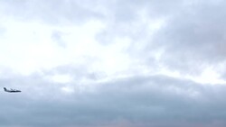 Propeller airplane in cloudy skies Stock Footage