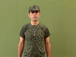 Soldier With Dog Tag Saluting Stock Footage