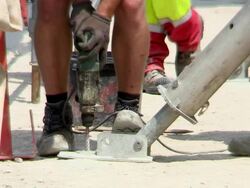 CU Shot of workmen operating drilling machine at construction for new bridge, Moselle river / Wellen, Rhineland Palatinate, Germany Stock Footage