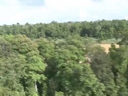 Aerial river through jungle, Maliau Basin, Sabah, Malaysia, Borneo Stock Footage