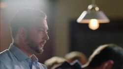 Bar owner chats with customer as bartender pours mixed drink Stock Footage