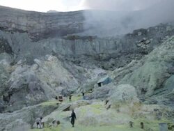 WS Miners working at the sulfur extraction on the Ijen volcano / Ijen, Java, Indonesia Stock Footage