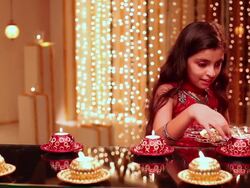 Girl burning candles in diwali festival Stock Footage