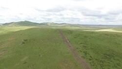 Vehicle Runs On Grassland Stock Footage