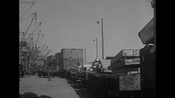 Freight train carries crates of US goods bound for Russia as part of Lend-Lease policy News Clip