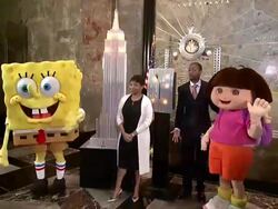 Marva Smalls and Nick Cannon Nick Cannon Helps Kick off Nickelodeon's Week-long 10th Annual Day of Play with Empire State Bldg Lighting Stock Footage