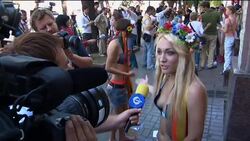 Semi-naked women protest censorship News Clip