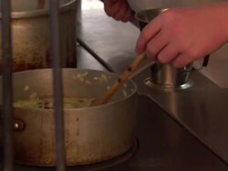 Student chefs working in kitchen News Clip