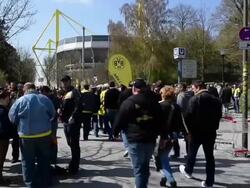 Mid shot of fans gathering around stadium grounds. Stock Footage