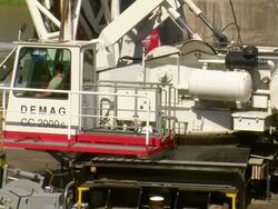 MS Crane working at deconstruction of bridge over river Mosel / Wellen, Rhineland Palatinate, Germany Stock Footage