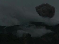 Ash and lava explode from crater of volcano at dusk, Stromboli, Italy. March 2010 Stock Footage