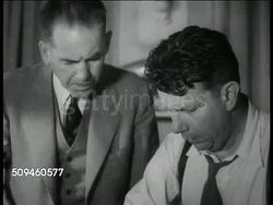 1938: MODEL CITY: Modern model city. Traffic Engineer Miller McClintock PhD. w/ designer Norman Bel Geddes showing road design, over passes, ramps, underpasses in modern city design. Instructional Video