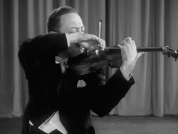 1951 Medium shot Jascha Heifetz playing violin during performance/ USA  Stock Footage