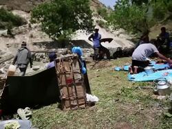 MS POV Men cooking at camp at Himalaya / Durma, Banke District, Nepal Stock Footage