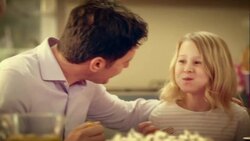 Family eating the birthday cake at the party table Stock Footage