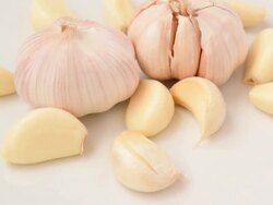 Close up of rotating  fresh garlic Stock Footage