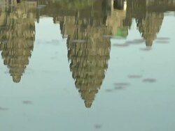 Pull Back Shot Angkor Wat Shadow in Water Siem Reap Cambodia Stock Footage