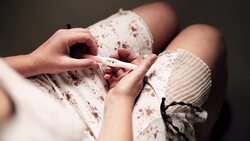 HD: Woman With a Pregnancy Test Stock Footage