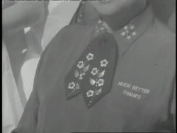 U.S. President Dwight D. Eisenhower sits in a wheelchair surrounded by doctors and nurses. News Clip