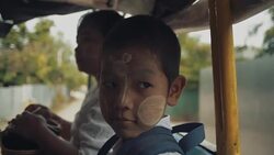 M/S Myanmar boy and mother in school bus Stock Footage