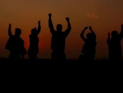 group of people in the sunset Stock Footage