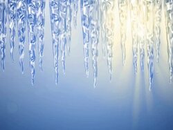 Spring sun melts icicles - loopable, HD Stock Footage