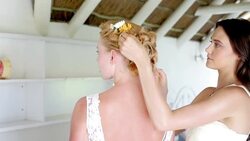 Bridesmaid fixing brideï¿½s hair before wedding Stock Footage