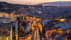 Elevated dusk view over Barcelona city centre, Catalunya, Spain - Time lapse Stock Footage