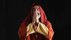 Senior Man In Medieval Priest Costume Praying Stock Footage