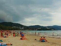 Heavy Black Stormy Shelf Cloud Above The Beach TIMELAPSE  with Crowd Stock Footage