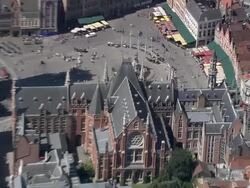 MS AERIAL ZI ZO PAN View of street cafÃŒÂ© at market in city / Flanders, Belgium Stock Footage