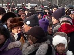 January 20, 2009 MS MONTAGE Sections of the crowd at the inauguration of Barack Obama / Washington DC / AUDIO Stock Footage