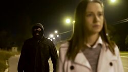 Robber stealing businesswoman bag in the street Stock Footage