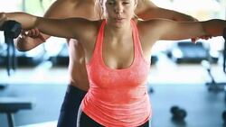 Gym workout with a trainer. Stock Footage