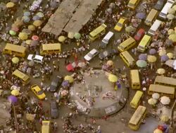 WS AERIAL DS View of market with traffic circle / Lagos, Nigeria Stock Footage