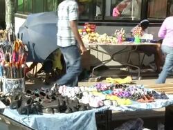 Street traders at roadside in Soweto News Clip