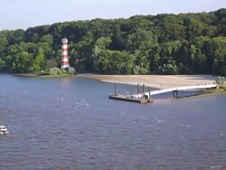 WS Side POV View of Lighthouse at Rissener Ufer near Elbe river / Wedel, Schleswig Holstein, Germany Stock Footage
