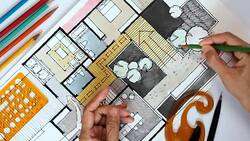 Designerï¿½s hand working with home floor plan Stock Footage